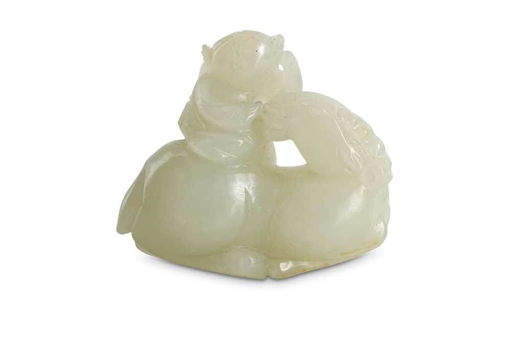 Lot 61 - A CHINESE WHITE JADE 'BOY AND RAM' CARVING.