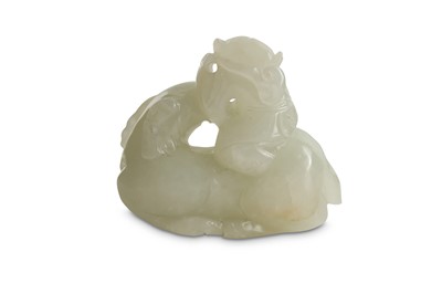 Lot 702 - A CHINESE WHITE JADE 'BOY AND RAM' CARVING.