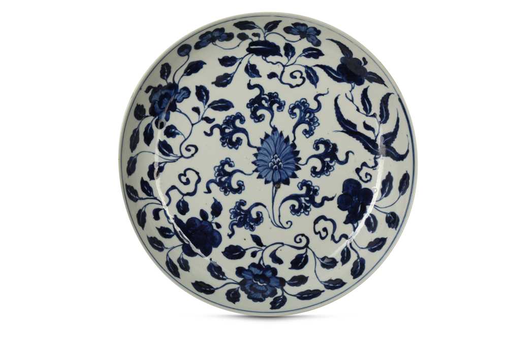 Lot 143 - A CHINESE BLUE AND WHITE 'LOTUS SCROLL' DISH.