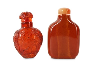 Lot 7 - TWO CHINESE AMBER SNUFF BOTTLES.