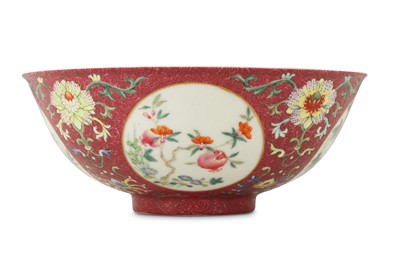 Lot 249 - A CHINESE FAMILLE ROSE RUBY-GROUND SGRAFFITO MEDALLION BOWL.