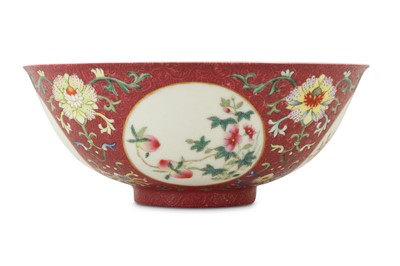 Lot 84 - A CHINESE FAMILLE ROSE RUBY-GROUND SGRAFFITO MEDALLION BOWL.
