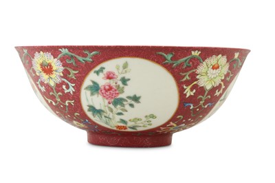 Lot 84 - A CHINESE FAMILLE ROSE RUBY-GROUND SGRAFFITO MEDALLION BOWL.