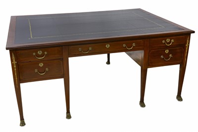 Lot 378 - A French Empire style mahogany kneehole partners desk
