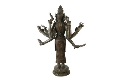 Lot 365 - A CHINESE BRONZE FIGURE OF A MULTI ARMED DEITY