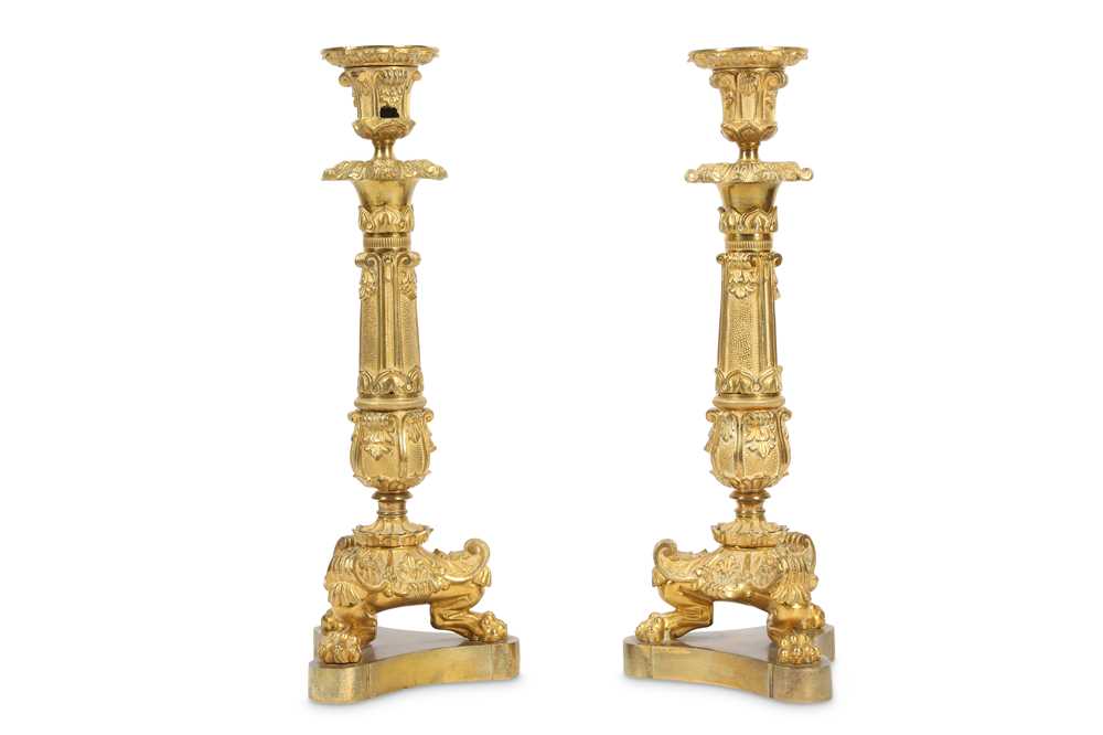 Lot 440 - A pair of early to mid century gilt bronze candlesticks