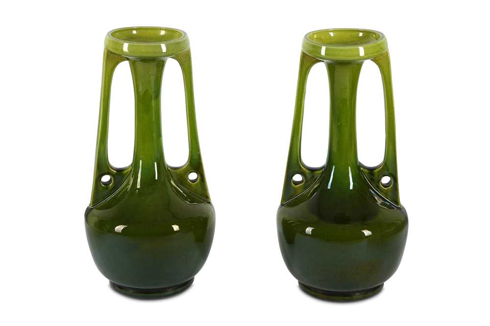 Lot 293 - A pair of Bretby Art Nouveau twin handle vases