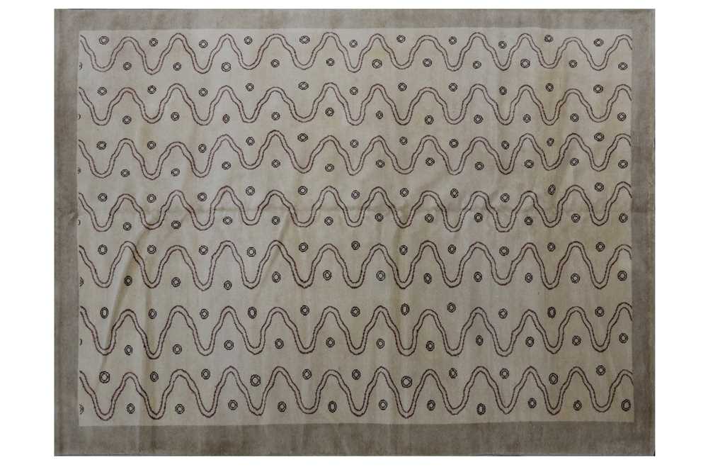 Lot 514 - A contemporary hand woven wool carpet