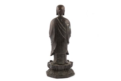 Lot 194 - A Chinese bronze figure of dizang Bodhisttva.