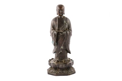 Lot 194 - A Chinese bronze figure of dizang Bodhisttva.