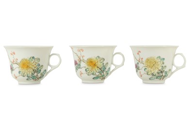 Lot 593 - THREE CHINESE FAMILLE ROSE 'CHRYSANTHEMUM' CUPS.