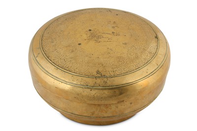 Lot 403 - A CHINESE BRONZE 'LOTUS SCROLL' CIRCULAR BOX AND COVER.