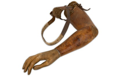 Lot 108 - A WORLD WAR I LEATHER AND CARVED WOOD PROSTHETIC ARM
