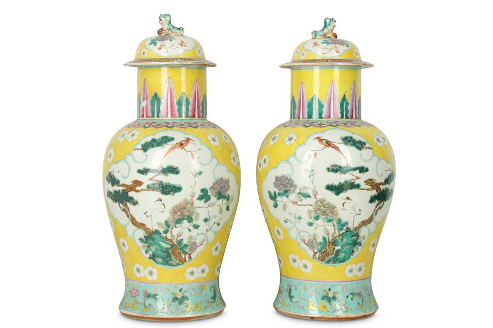 Lot 319 - A PAIR OF CHINESE FAMILLE ROSE YELLOW-GROUND BALUSTER VASES AND COVERS.