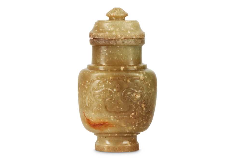 Lot 510 - A SMALL CHINESE PALE CELADON JADE VASE AND COVER.