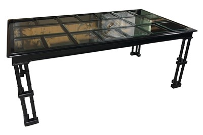 Lot 18 - A circa 1970's black lacquered dining table