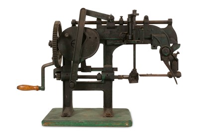 Lot 140 - A LATE 19TH CENTURY AMERICAN CAST IRON APPLE PEELING MACHINE