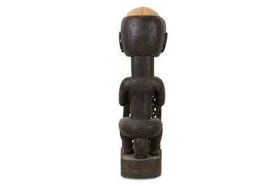 Lot 6 - TRIBAL INTEREST: A DAYAK HUMAN SKULL TROPHY ON LATER STAND
