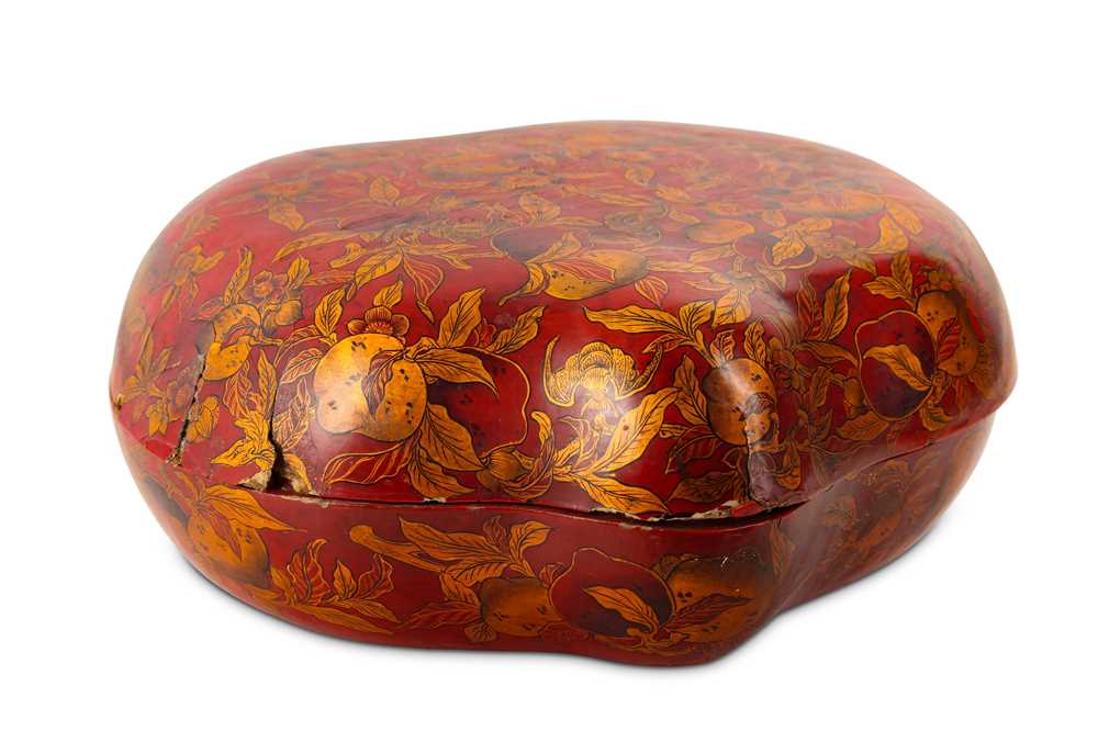 Lot 583 - A CHINESE LACQUER PEACH-SHAPED BOX AND COVER.