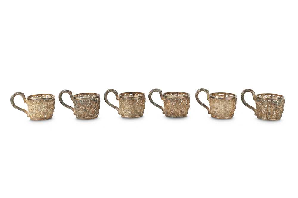 Lot 586 - A SET OF SIX CHINESE SILVER RETICULATED CUP HOLDERS.