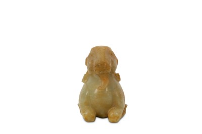 Lot 40 - A CHINESE PALE CELADON JADE CARVING OF A RAM.