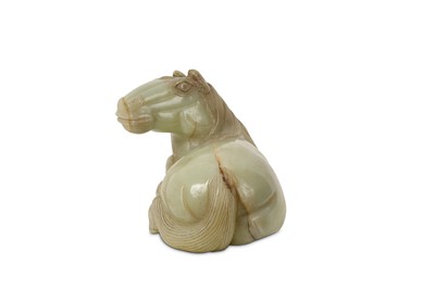Lot 41 - A CHINESE PALE CELADON JADE CARVING OF A RECUMBENT HORSE.