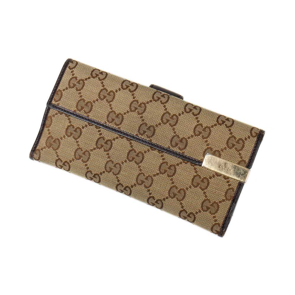 Lot 34 - Gucci Beige Monogram Canvas Long Bi-Fold Flap Wallet