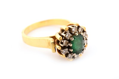 Lot 54 - An emerald and diamond ring