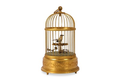 Lot 120 - A 20TH CENTURY SWISS SINGING BIRD IN CAGE BY REUGE