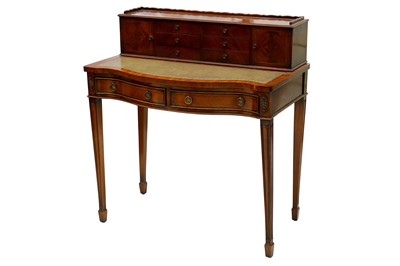 Lot 396 - A mid to late 20th Century George III style bow fronted mahogany writing table