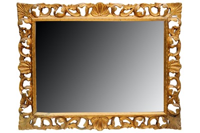 Lot 390 - A late 20th Century Florentine style rectangular giltwood framed wall mirror