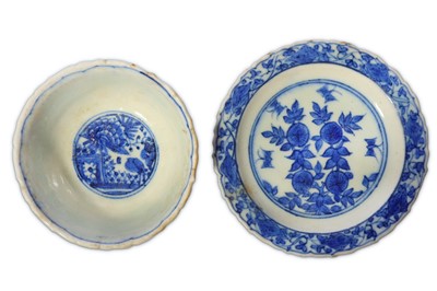 Lot 18 - * A BLUE AND WHITE POTTERY BOWL WITH SAUCER