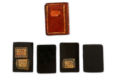 Lot 54 - * FOUR QAJAR LACQUERED PAPIER-MÂCHÉ PLAYING CARDS AND CASE