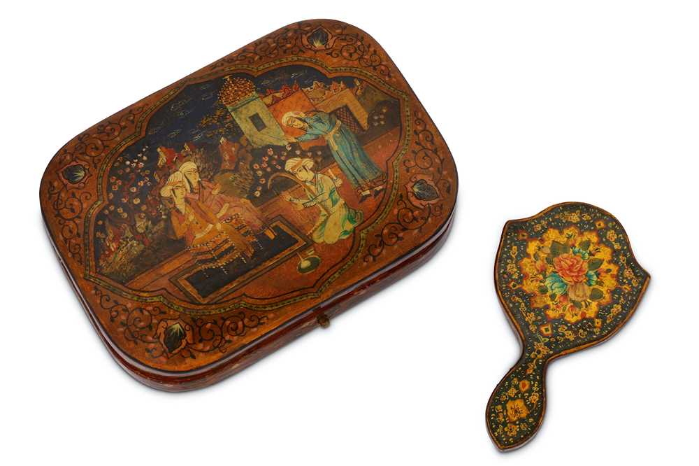 Lot 55 - * A PERSIANISED LACQUERED PAPIER-MÂCHÉ POCKET SEWING BOX AND A QAJAR POCKET MIRROR