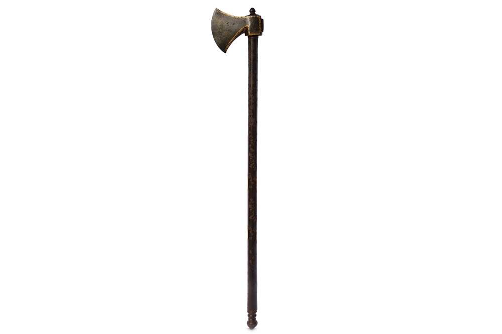 Lot 31 - * A SMALL STEEL AXE WITH GOLD-DAMASCENED HEAD (TABARZIN)
