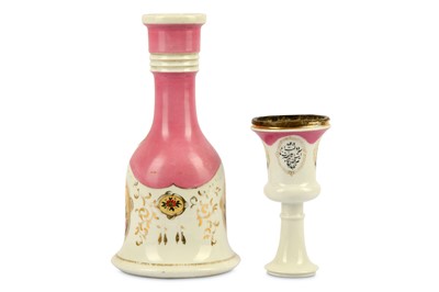 Lot 84 - * A PORCELAIN WATER PIPE (QALYAN) BOTTLE AND STEM CUP