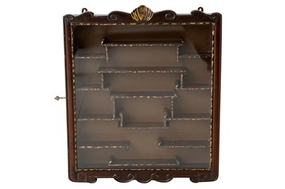 Lot 331 - A mid 20th Century mahogany and parcel gilt netsuke display cabinet