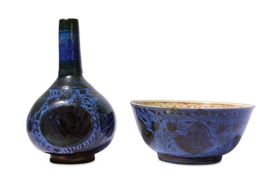Lot 13 - * A SAFAVID COPPER-LUSTRE AND BLUE POTTERY BOWL AND BOTTLE