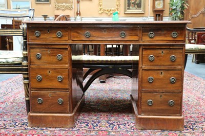 Lot 30 - A 19th Century American walnut pedestal desk...