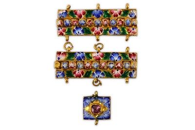 Lot 97 - * A GROUP OF FOUR MISCELLANEOUS QAJAR POLYCHROME-ENAMELLED GOLD JEWELLERY ELEMENTS