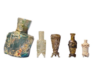Lot 4 - * FOUR SMALL EARLY ISLAMIC GLASS OINTMENT FLASKS AND A MISFIRED BOTTLE