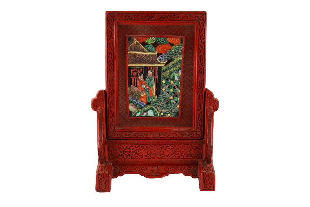 Lot 205 - A Chinese porcelain plaque inlaid cinnabar lacquer table screen.