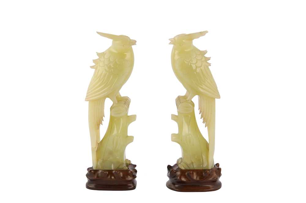 Lot 219 - A pair of Chinese carved serpentine birds.