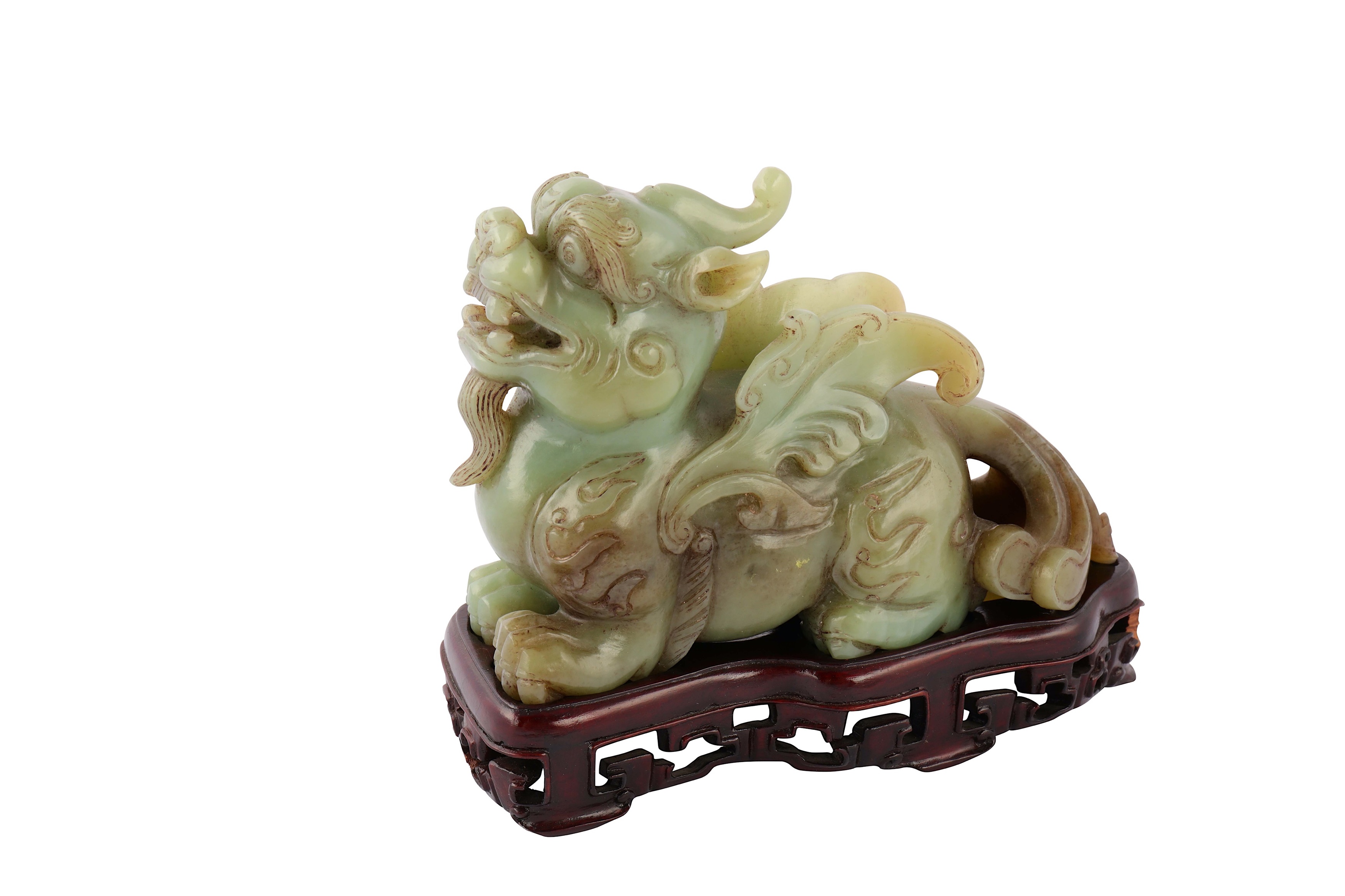 Lot 517 - A Chinese Celadon Jade 'bixie' Carving And A