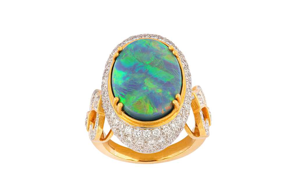 Lot 26 - An opal and diamond dress ring