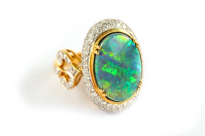 Lot 26 - An opal and diamond dress ring