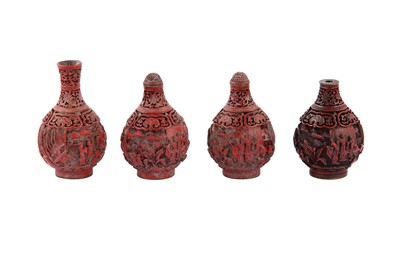 Lot 221 - A collection of Chinese cinnabar lacquer snuff bottles together with a miniature vase.