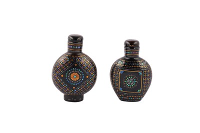 Lot 226 - Two Chinese mother of pearl inlaid black lacquer snuff bottles.