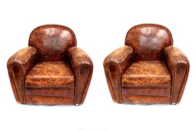Lot 717 - A pair of late 20th century French Art Deco style brown leather upholstered club chairs
