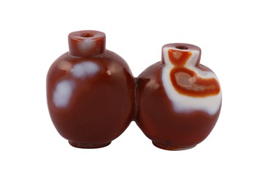 Lot 234 - A Chinese Peking glass twin snuff bottle.